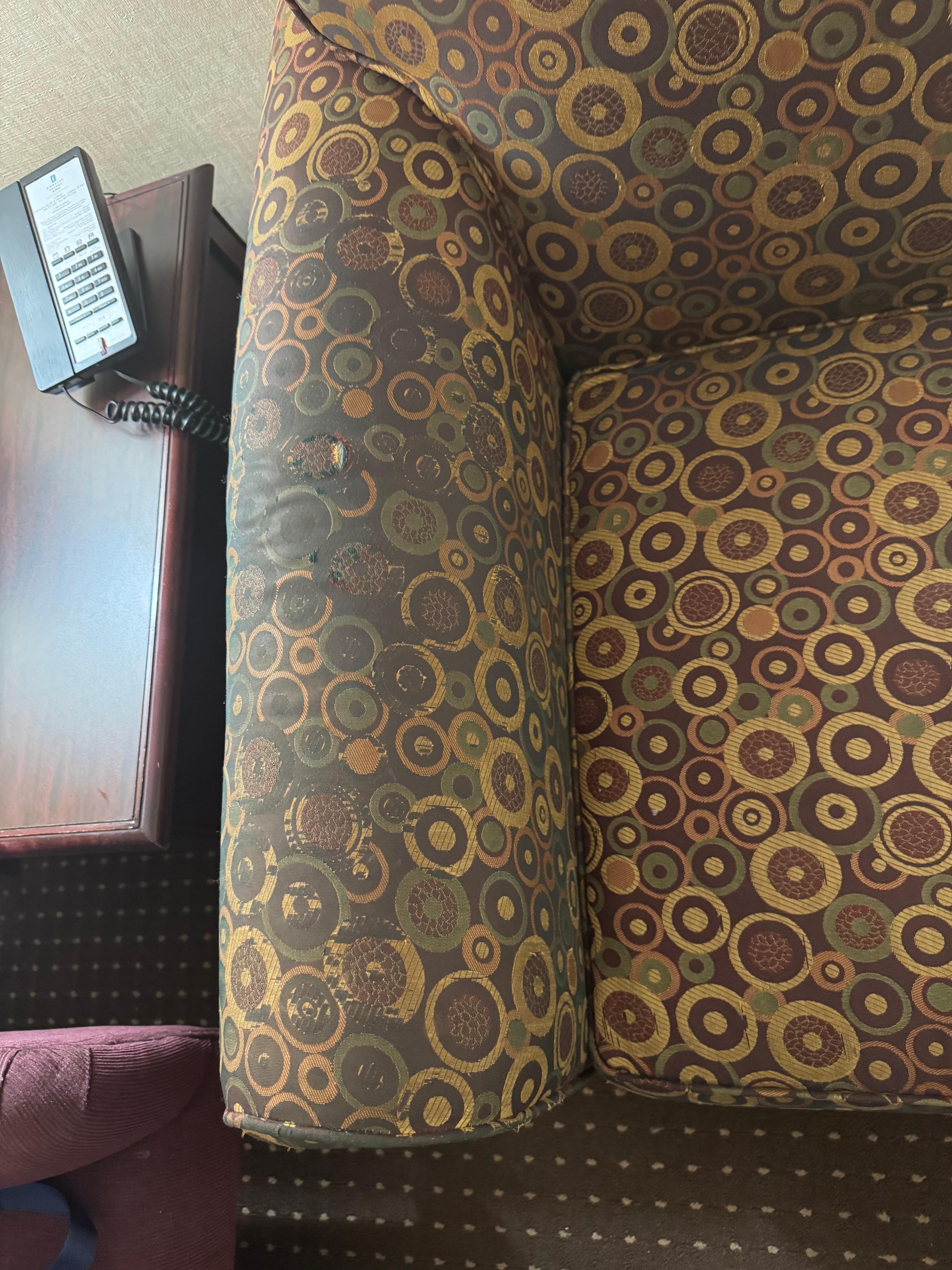 Oily, dirty, torn sofa