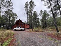 Driveway view of front house