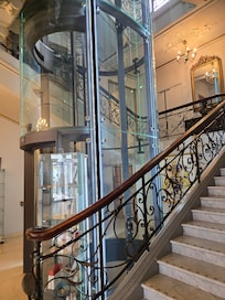 Inside hotel, the beautiful old world elevator.