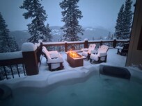 Snowing while enjoying the hot tub and fire pit!