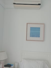Air con malfunction above my bed and the electrical socket hanging off the wall which could have caused a fire, electrocution or worse!!