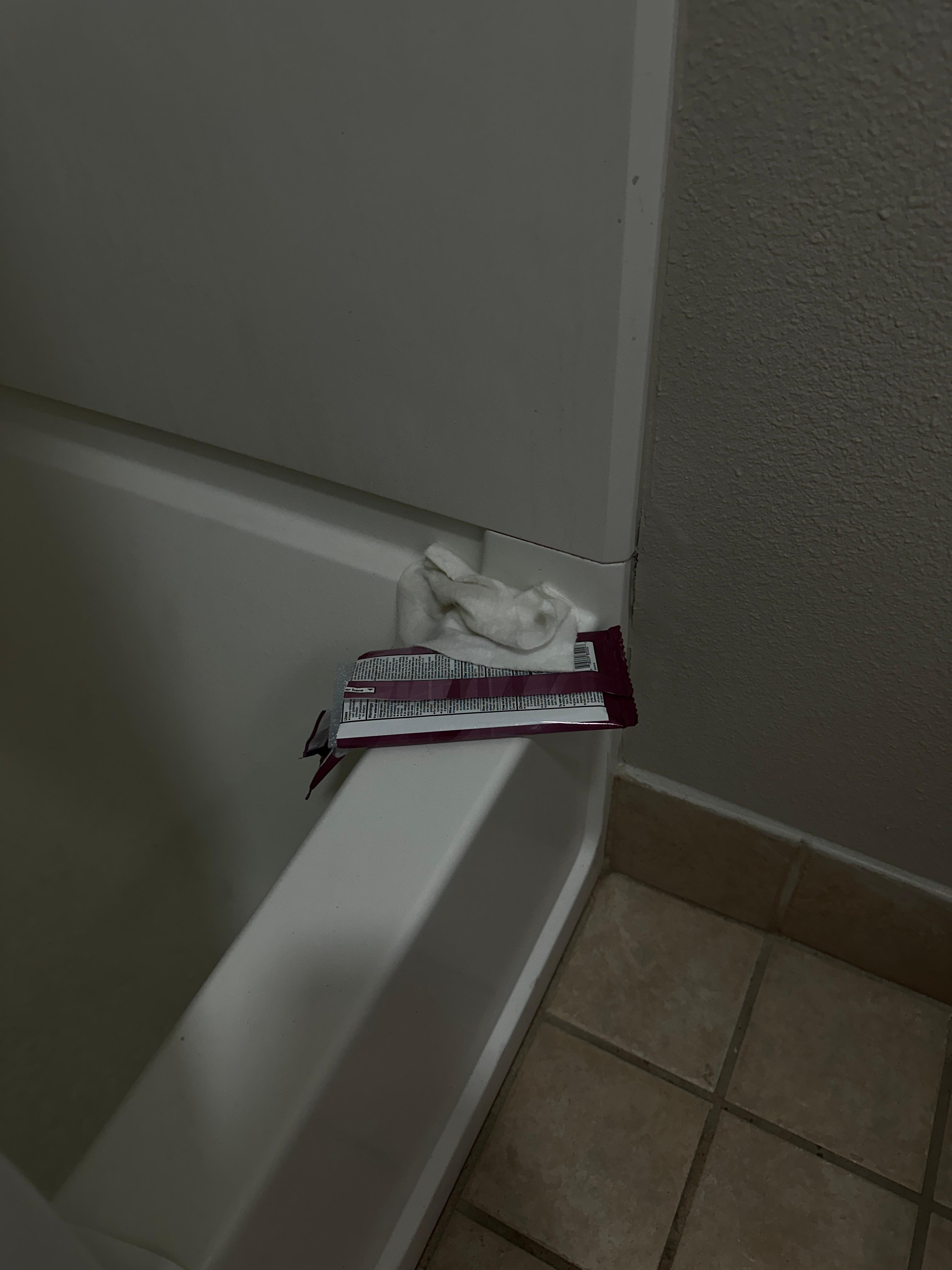 Used cleaning wipes with the empty package left 