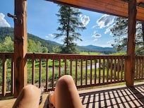 Relaxing & enjoying views from the deck after walking across the creek!