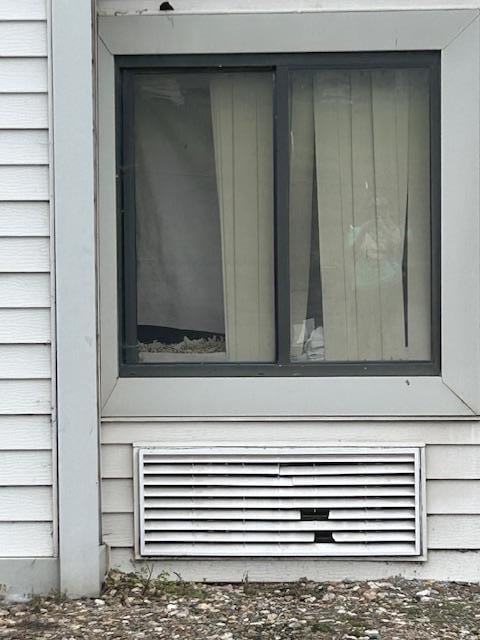 Broken blinds and wear on the outside.