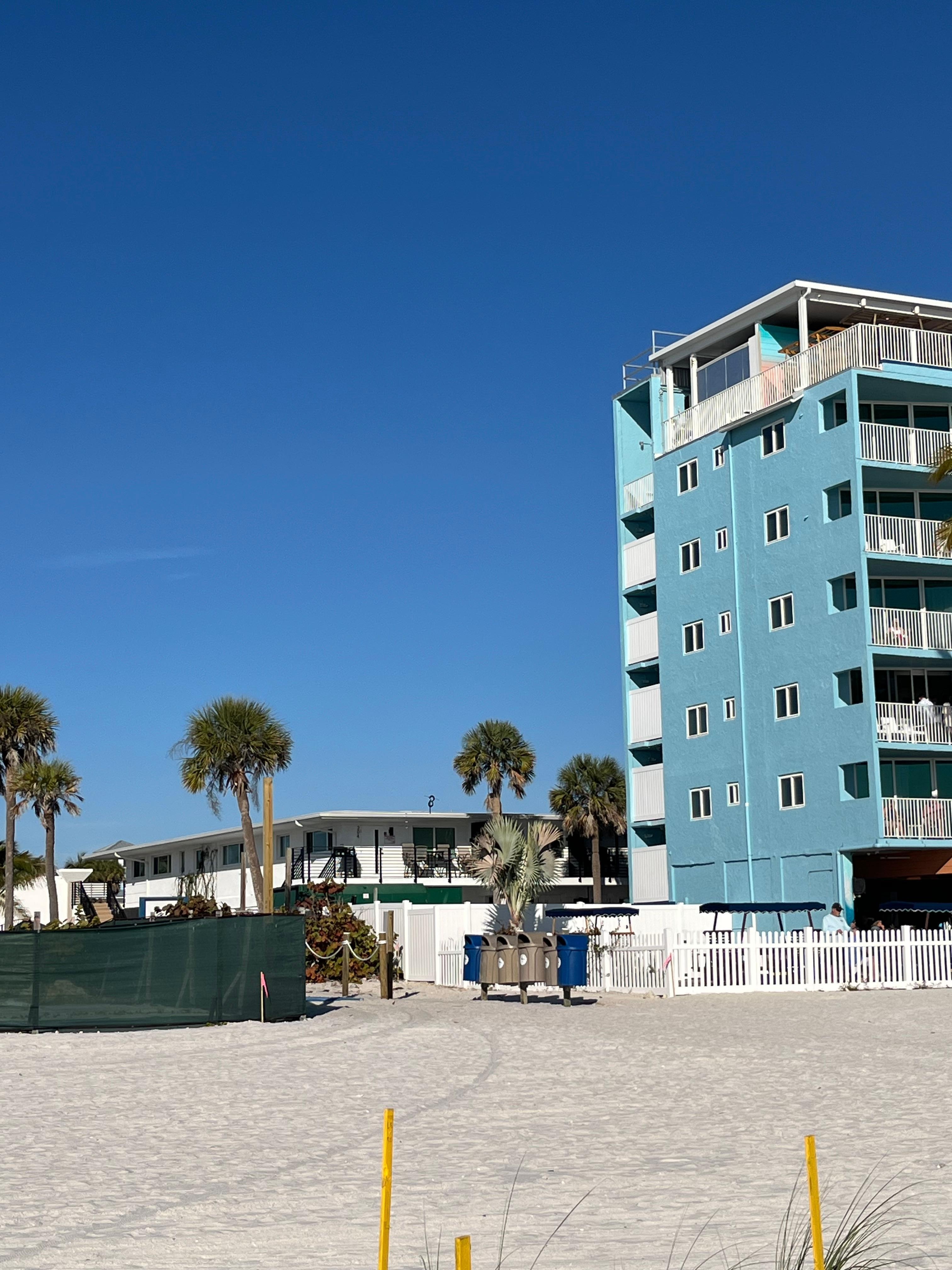 The white condo behind Lani Kai (blue resort)