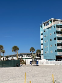 The white condo behind Lani Kai (blue resort)