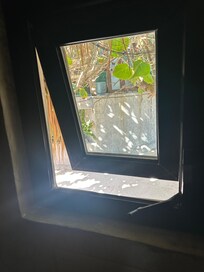 Bathroom window in direct sight of bar
