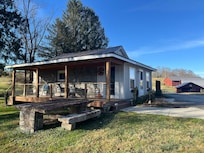 Lovely view of the cottage and farm.