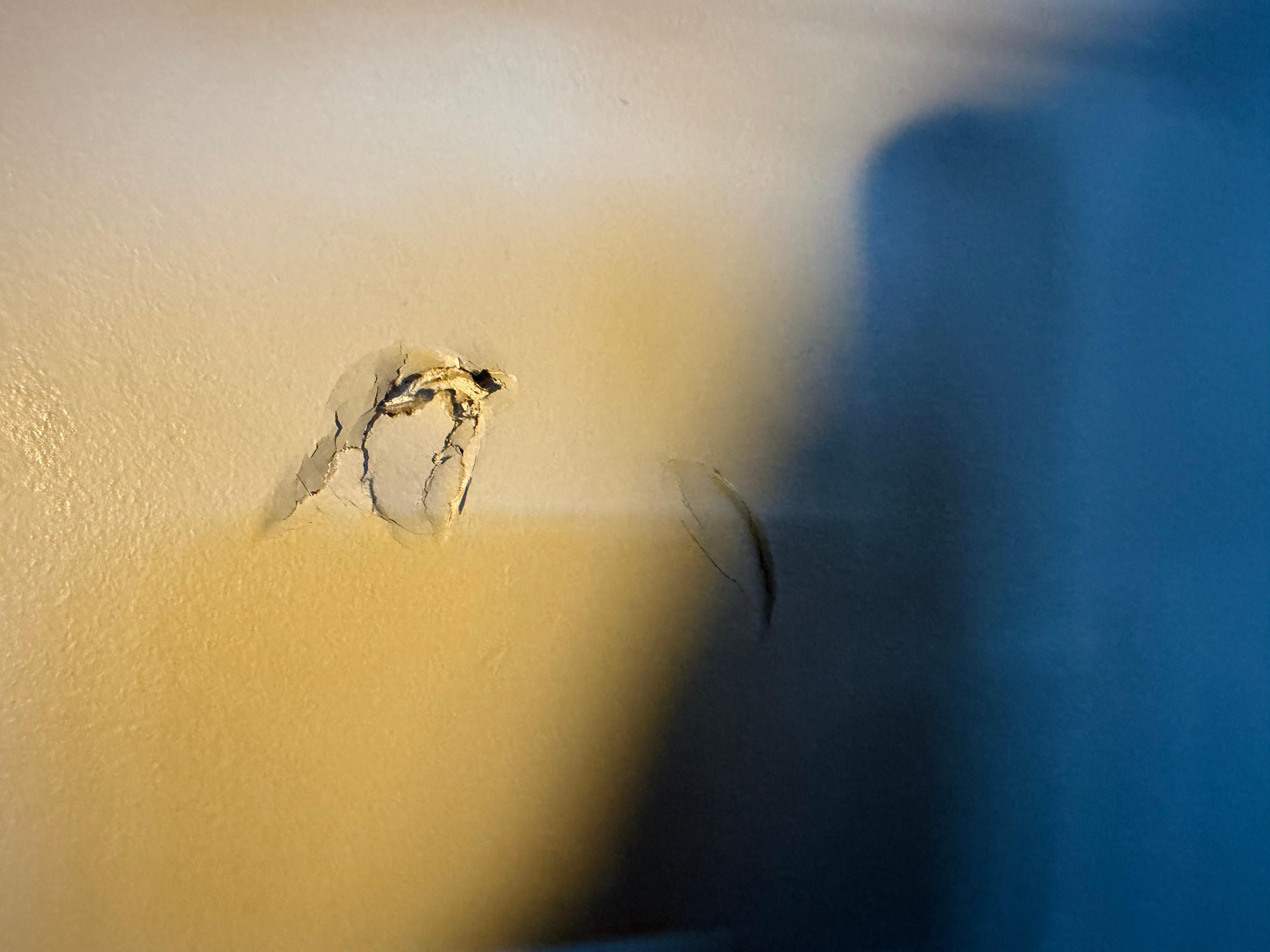 Hole in wall of one of the rooms