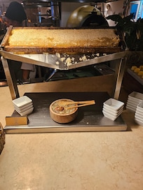 The amazing breakfast buffet had natural honey, fresh juices, waffles that rivaled Belgium's, omlettes to order, and much more! This buffet was one of the best in the world. One morning they had live violin music that added to the experience.