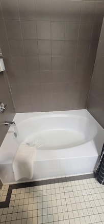 The tub was clean and water was HOT, too hot at times. Shower pressure was okay.