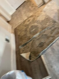 Everyone kept tripping on this rug that was over trim where fireplace used to be.