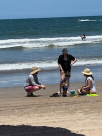Our family having fun at the calm beach