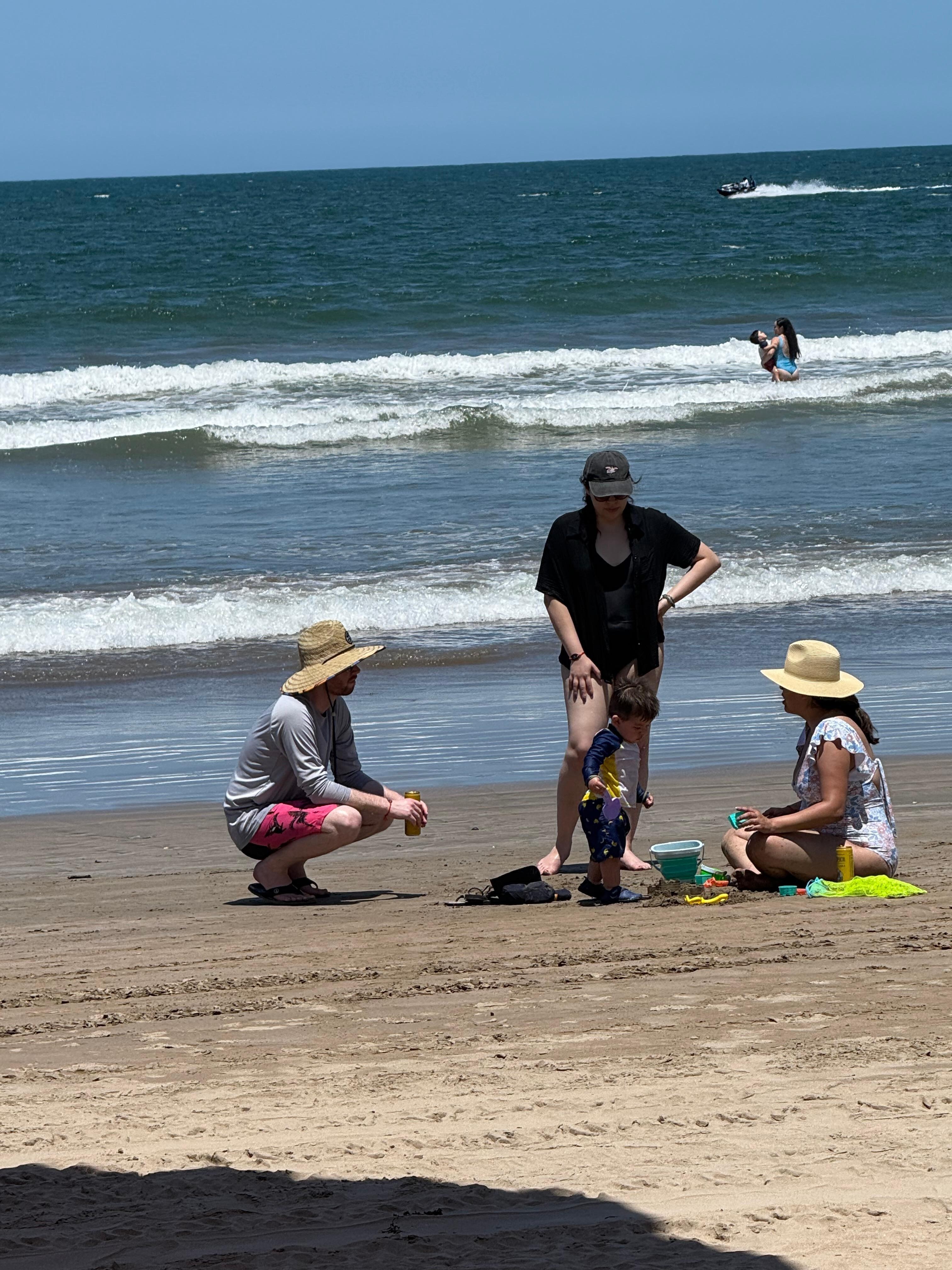 Our family having fun at the calm beach