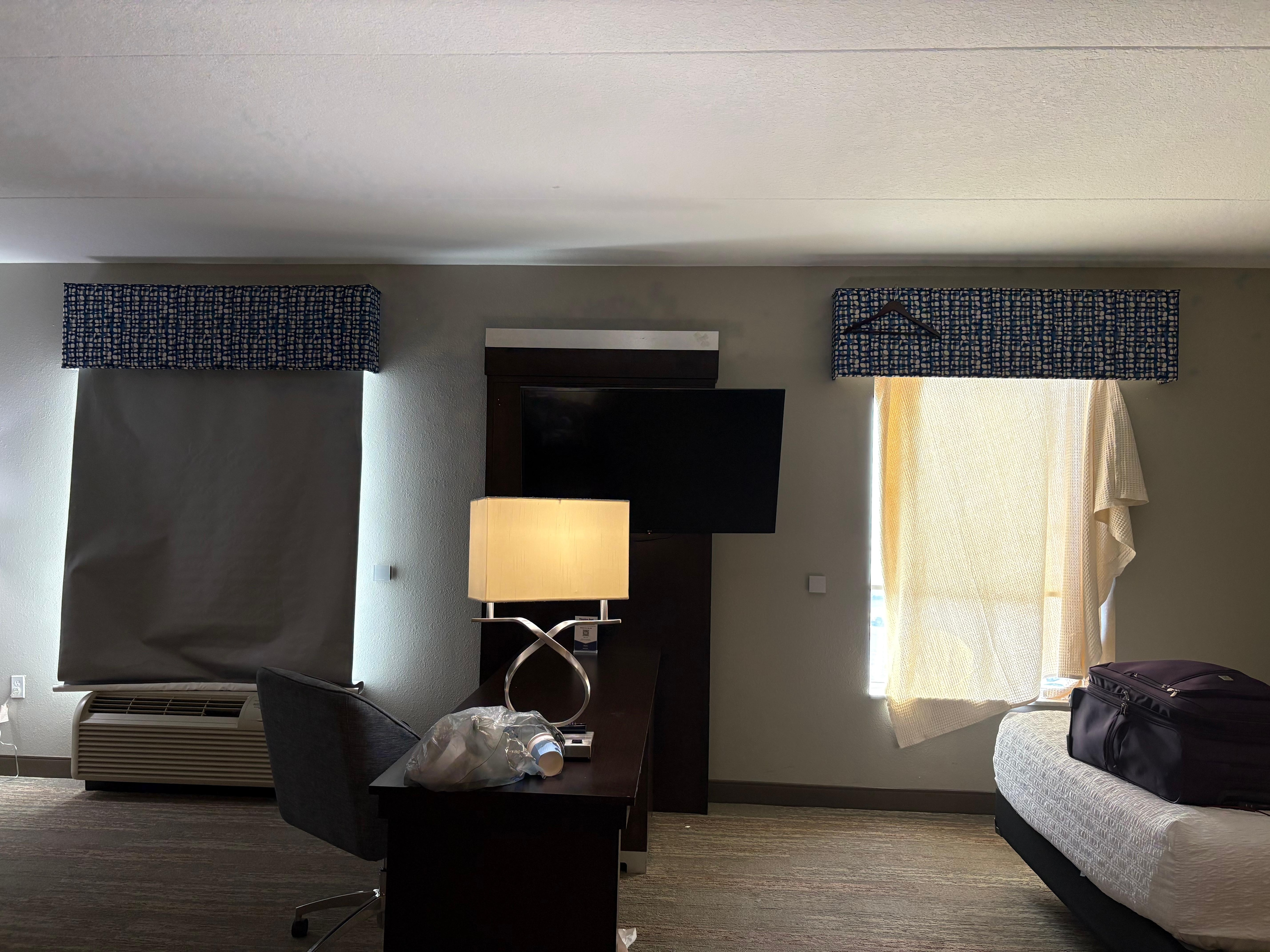 The window on the right, we had to hang a sheet over it. The window on the left they had something hanging over it that the hotel staff put up there. 