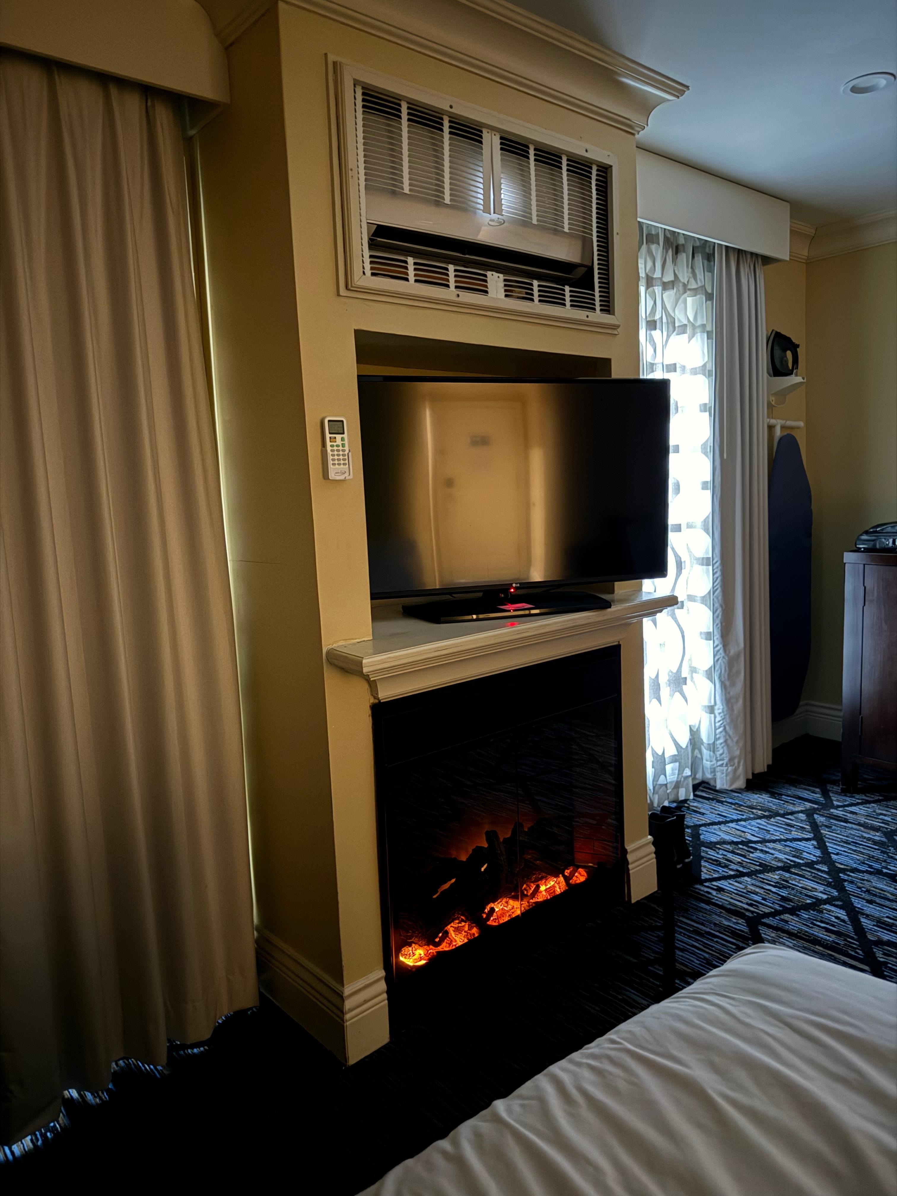 Windows look out to wall; other windows. 