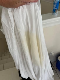 Stained linens and blanket