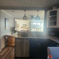 Entering from the back door is the kitchen. New appliances and everything you would need to cook a meal.
