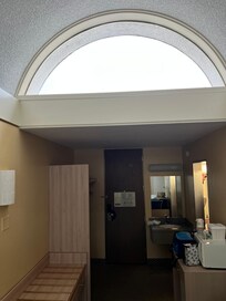 The giant skylight window in the room