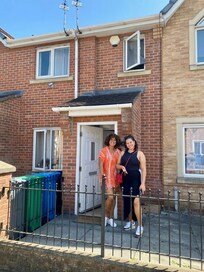 Pic of us outside the apartment.