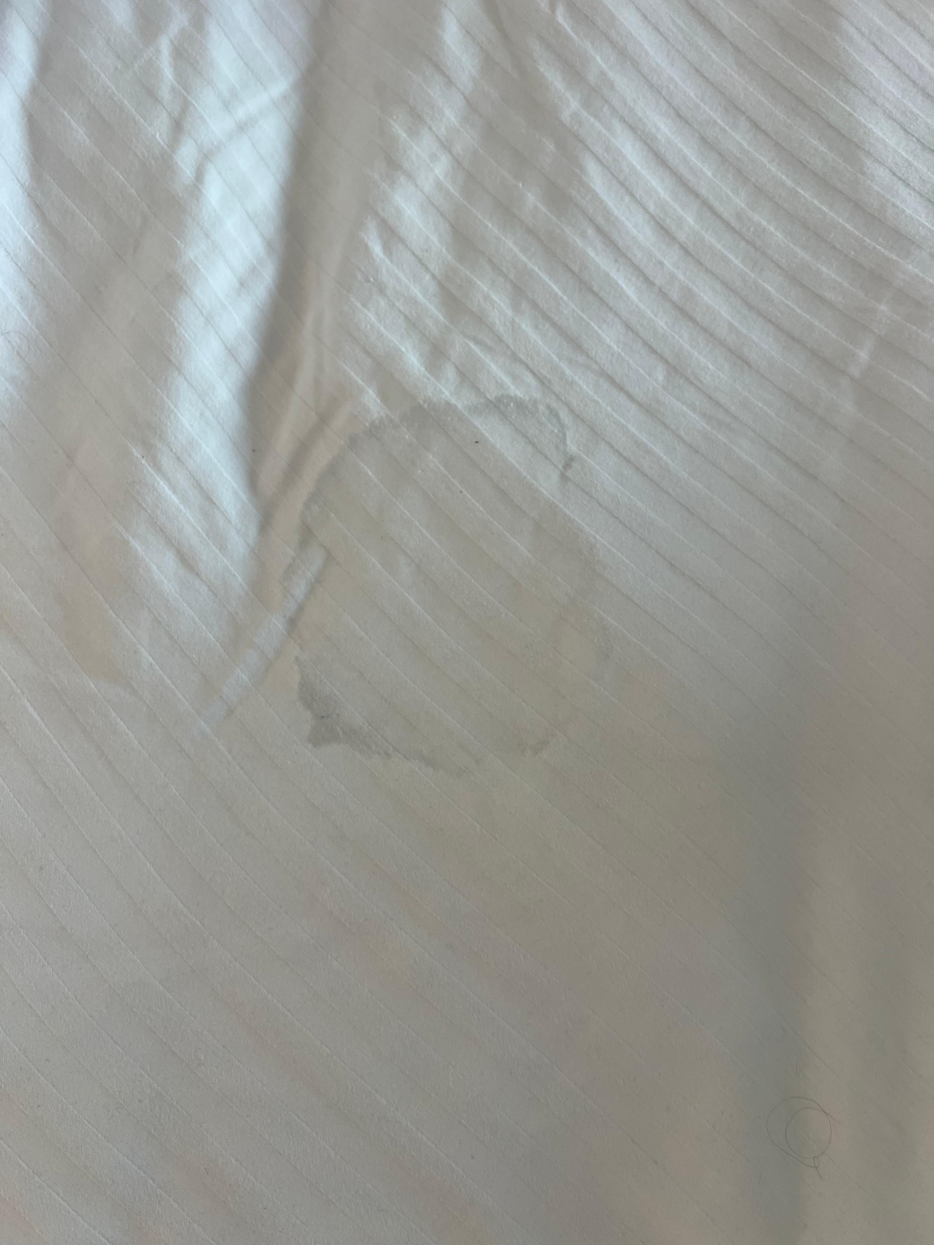 Stain in bed. We took the sheets off to look for bedbugs and the mattress was covered in stains and almost yellow 