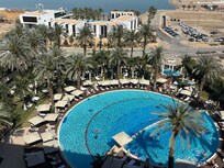 All rooms overlook pool and close private beach