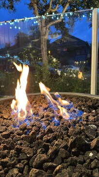 A gas powered fire pit on the patio was a lovely place to relax at the end of the day