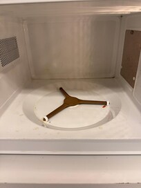 Under this glass round plate in microwave was chunks of dried up food and the wheels on the rack that sits under the plate in the microwave the wheels were so corroded with dirty funk food. It was atrocious. I forgot to snap a picture of that as dis