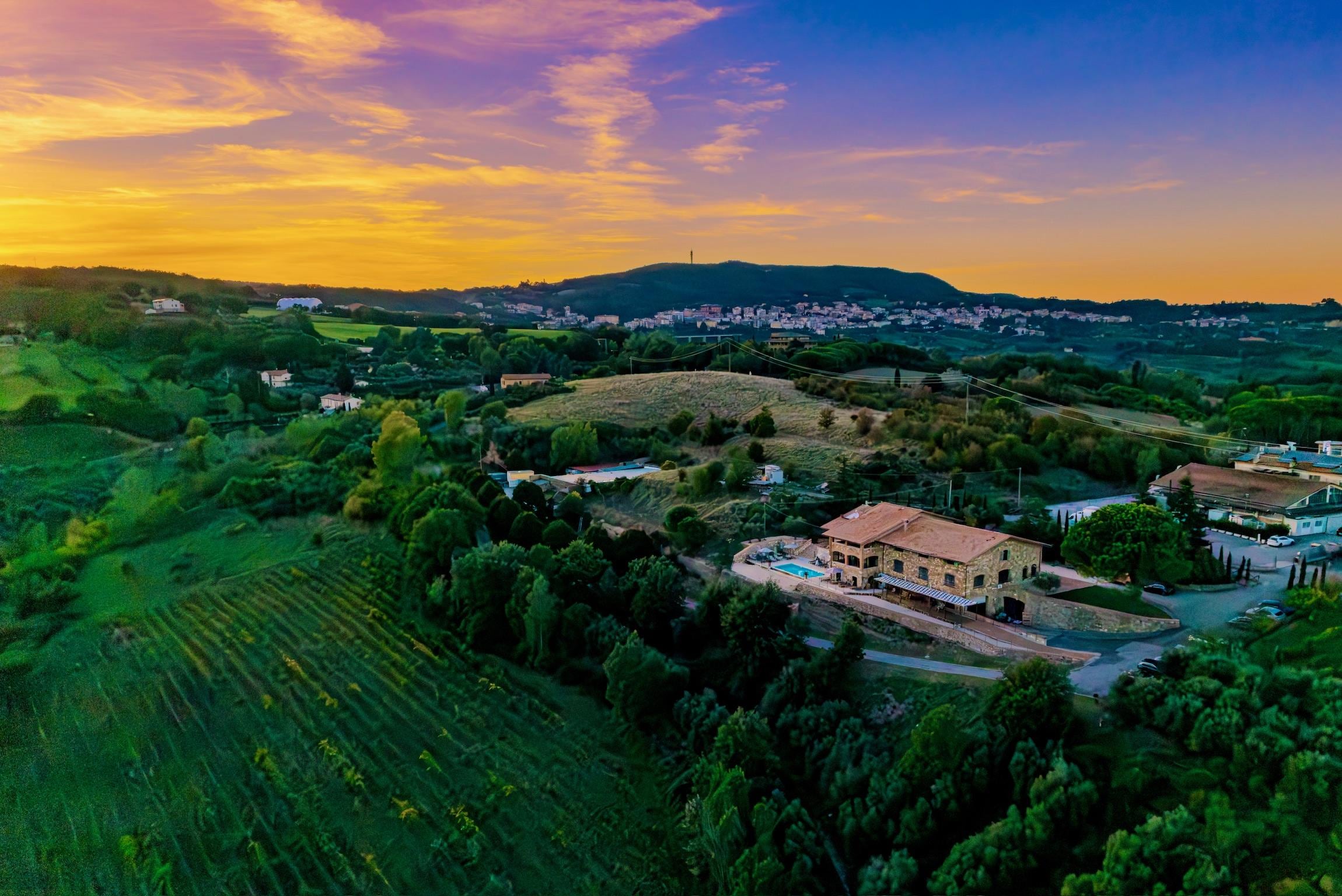 Overview of the hotel, at sunset.