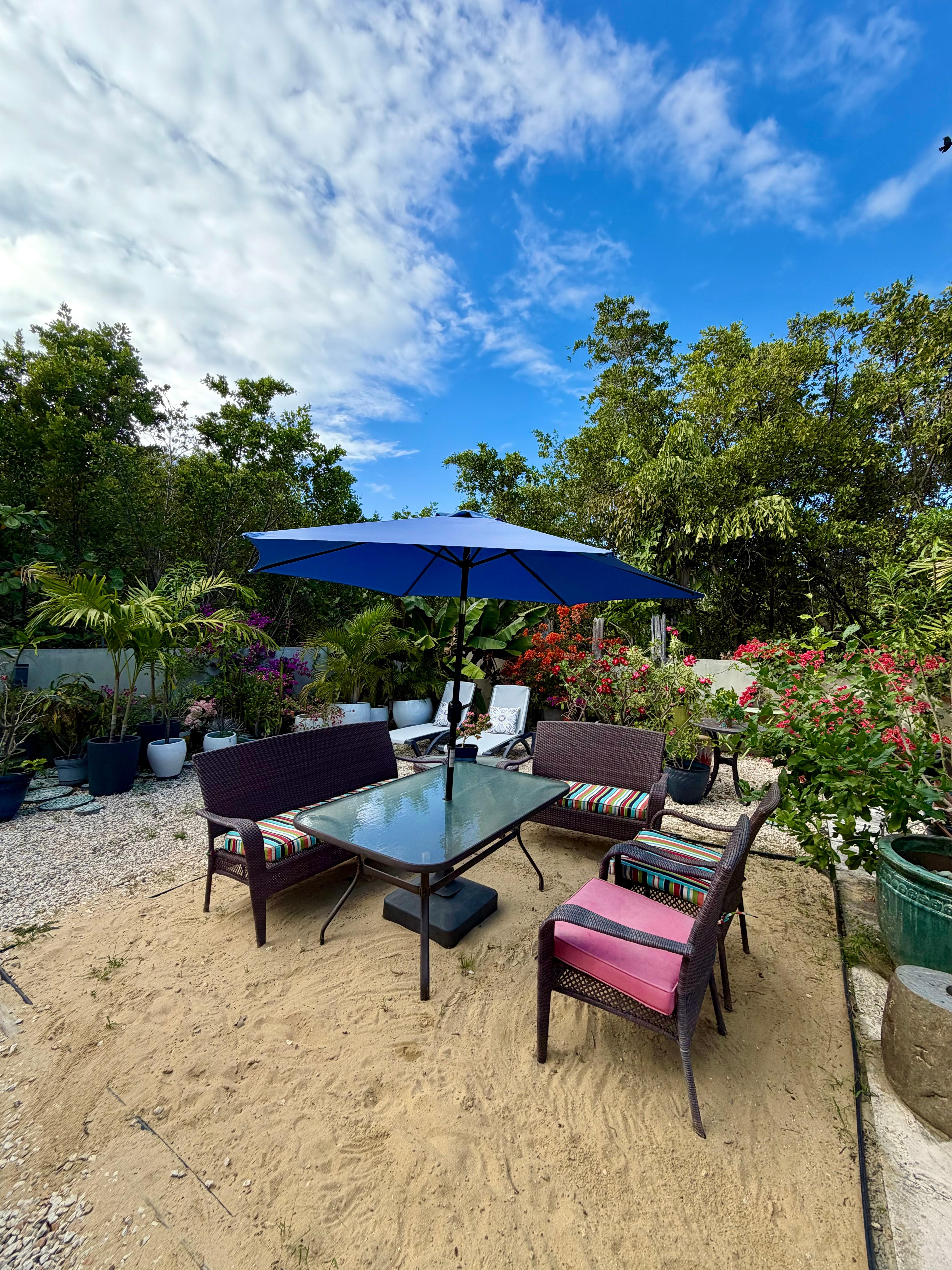 Tucked in back, relaxing sandy zen area to chill