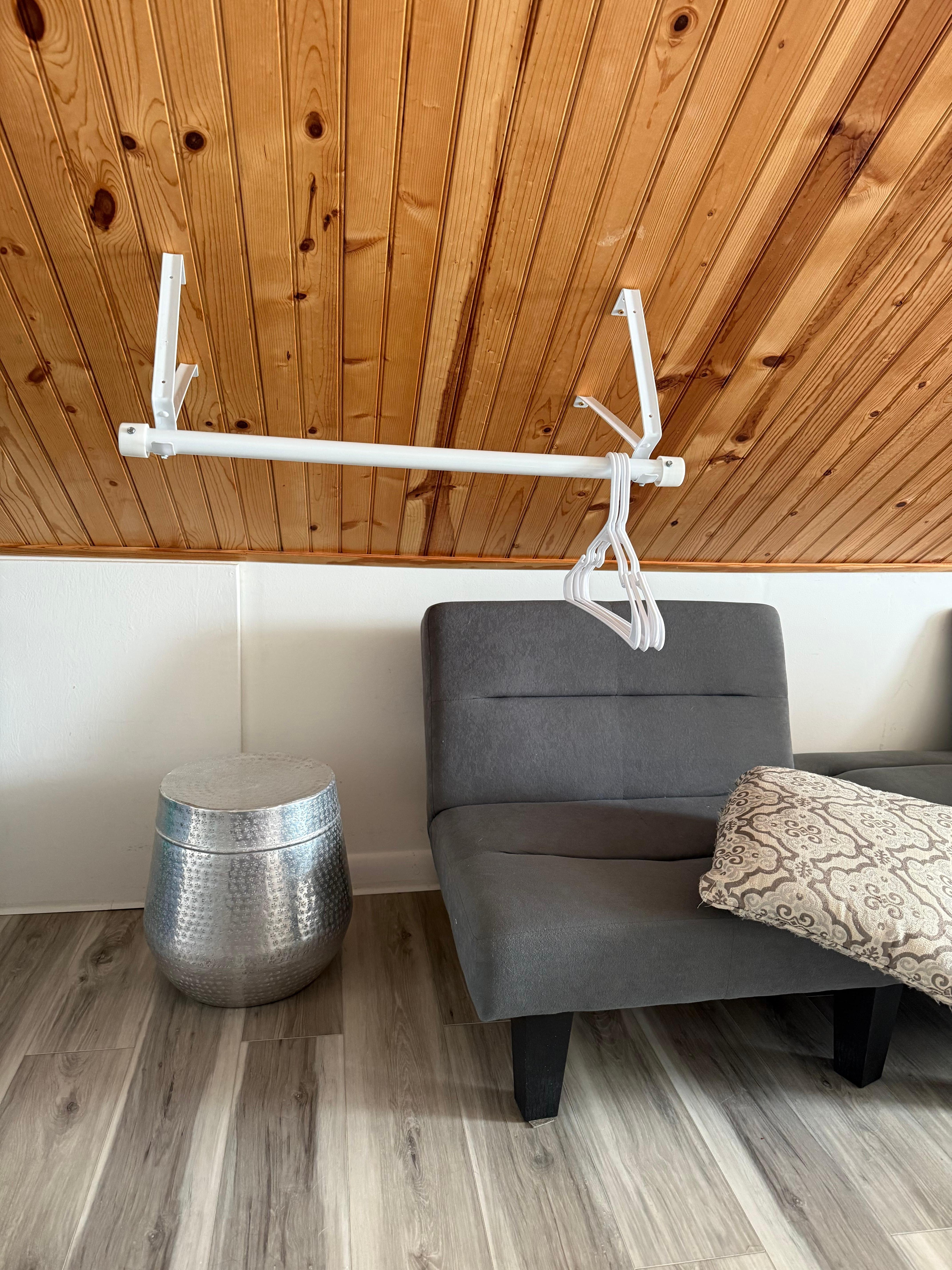 The ceiling on both sides of the room go very low. 