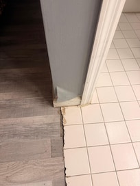 Wall peeling and the separation of the tile and laminate is a mess
