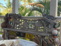Hand carved bench on lanai.