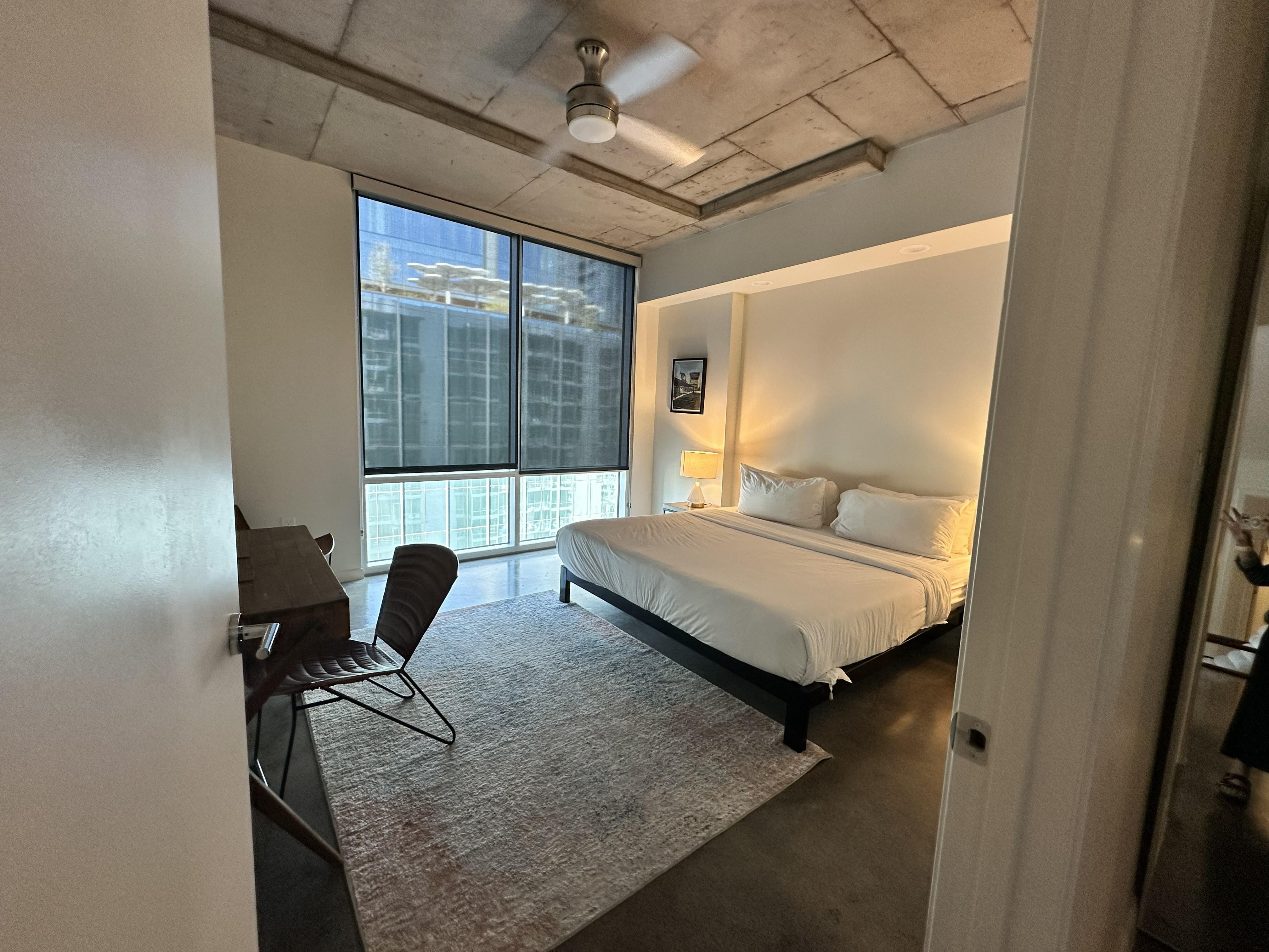 One of the bedrooms with a bathroom just next to it.