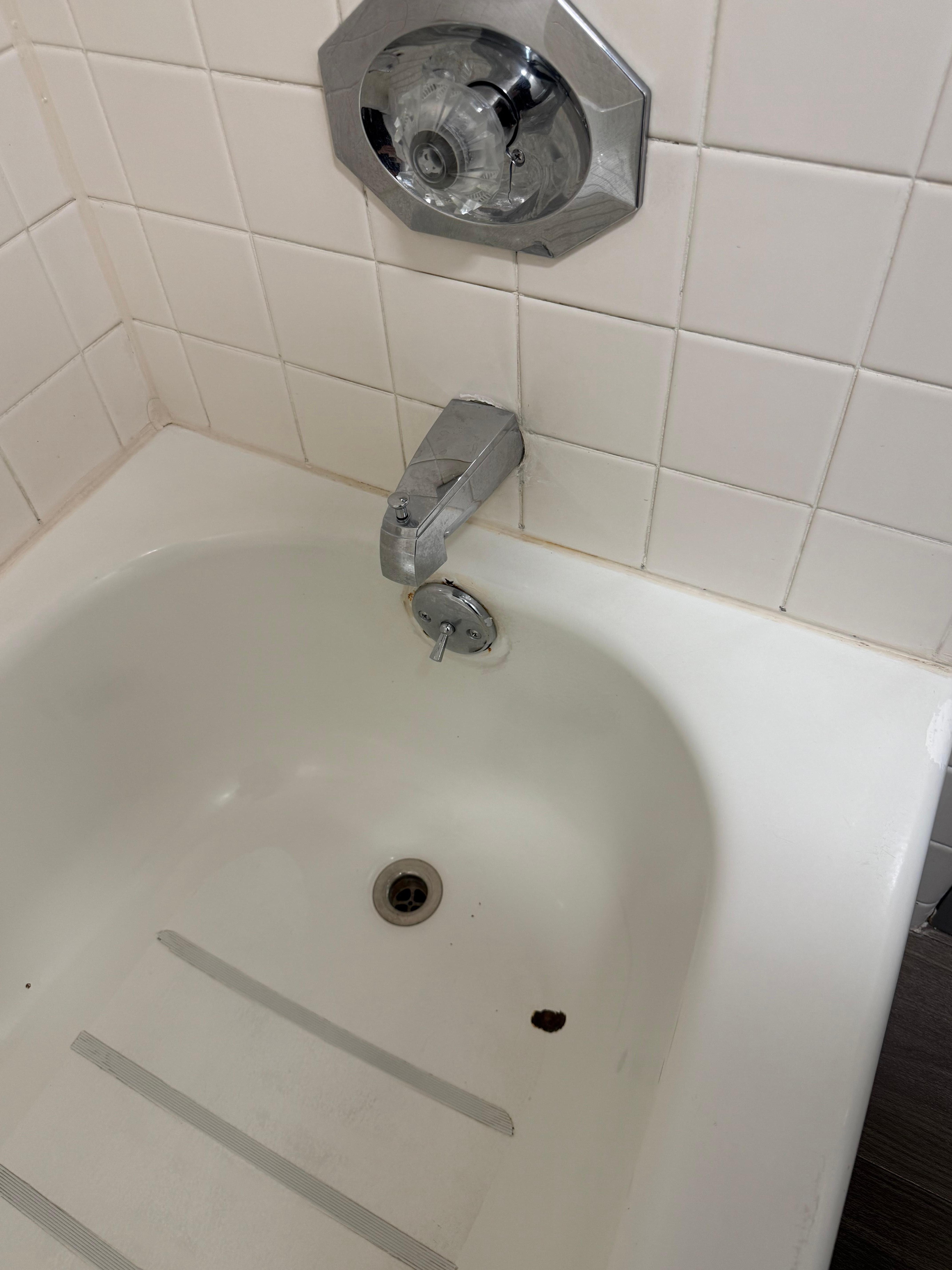 Dirty and scuffed bathroom 