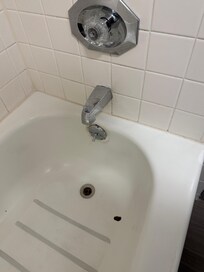 Dirty and scuffed bathroom