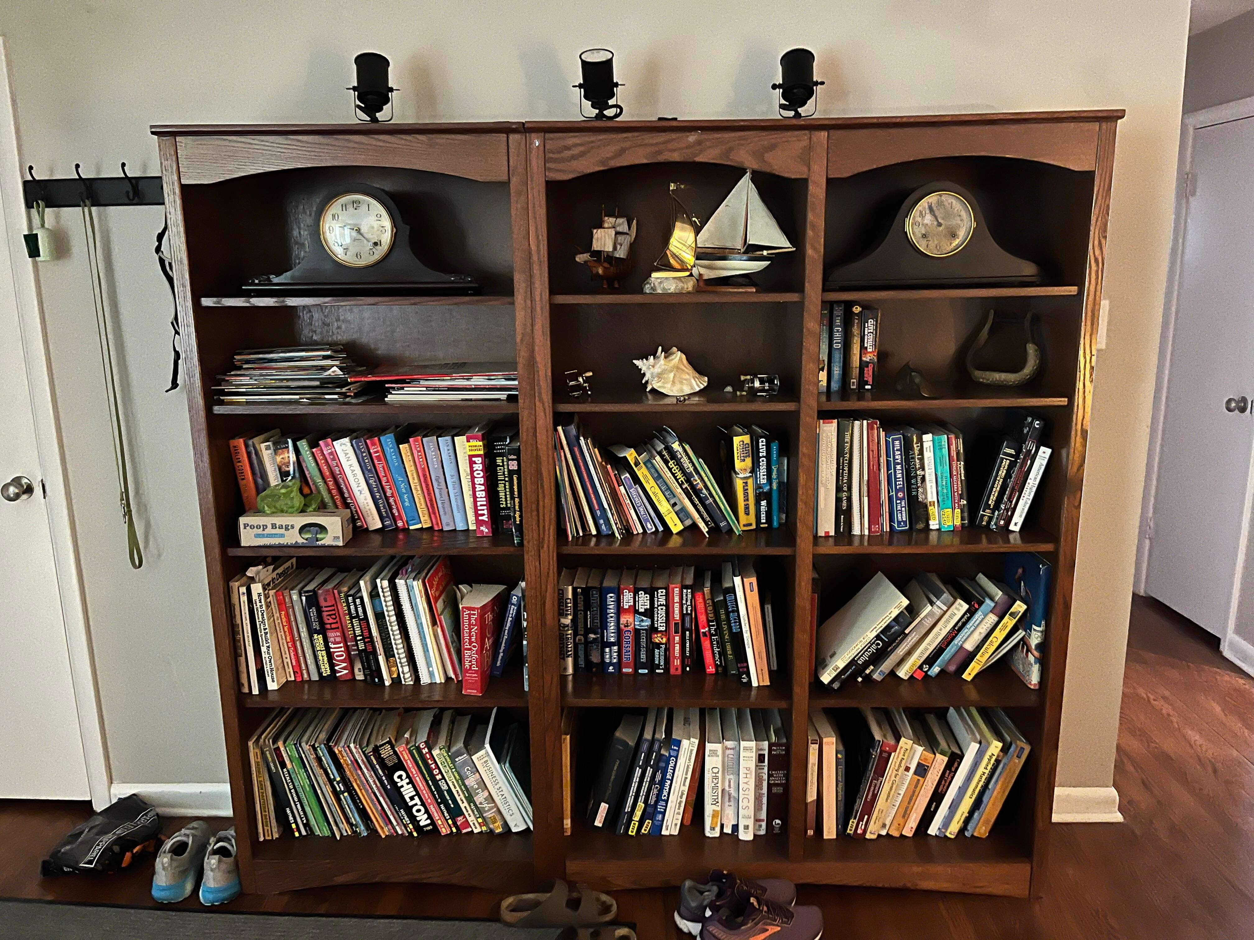 Fully stocked bookshelves as you come in the front door.