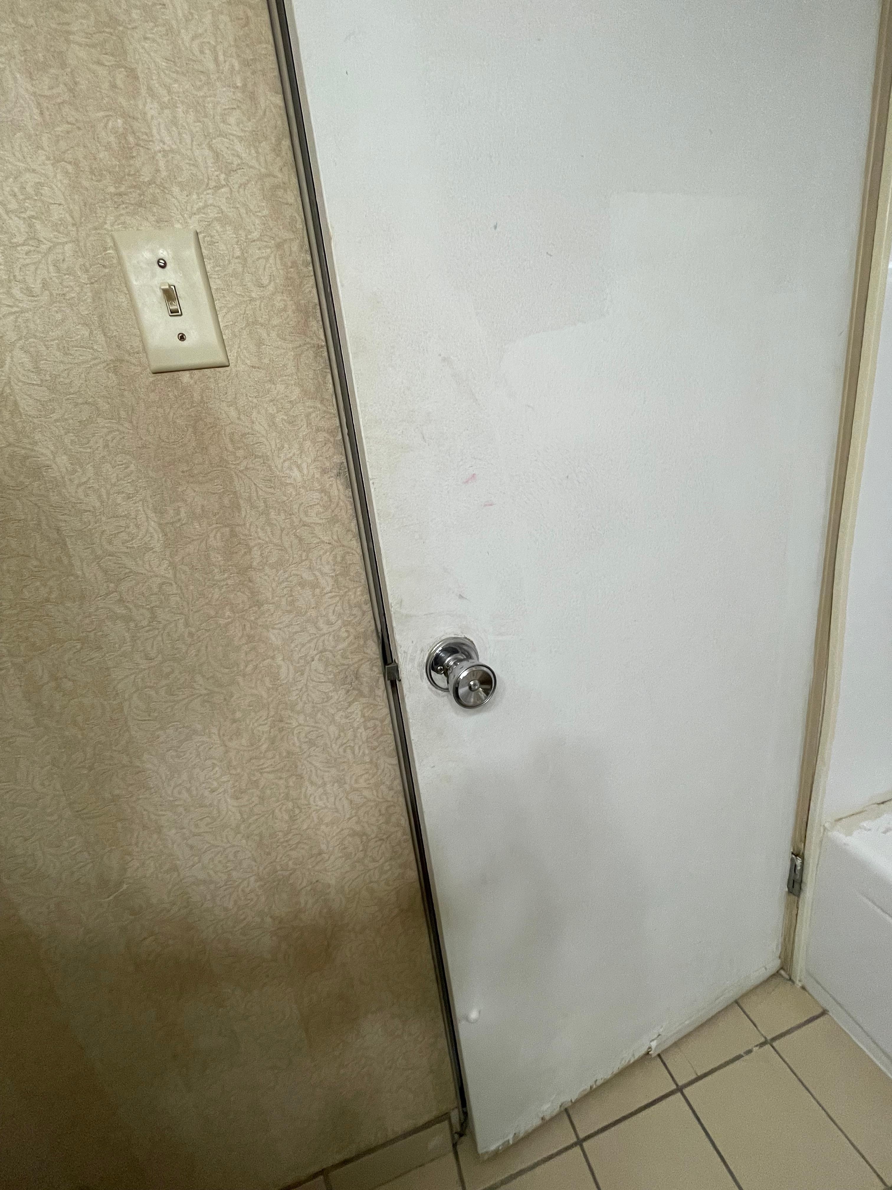 Inside bathroom door - broken