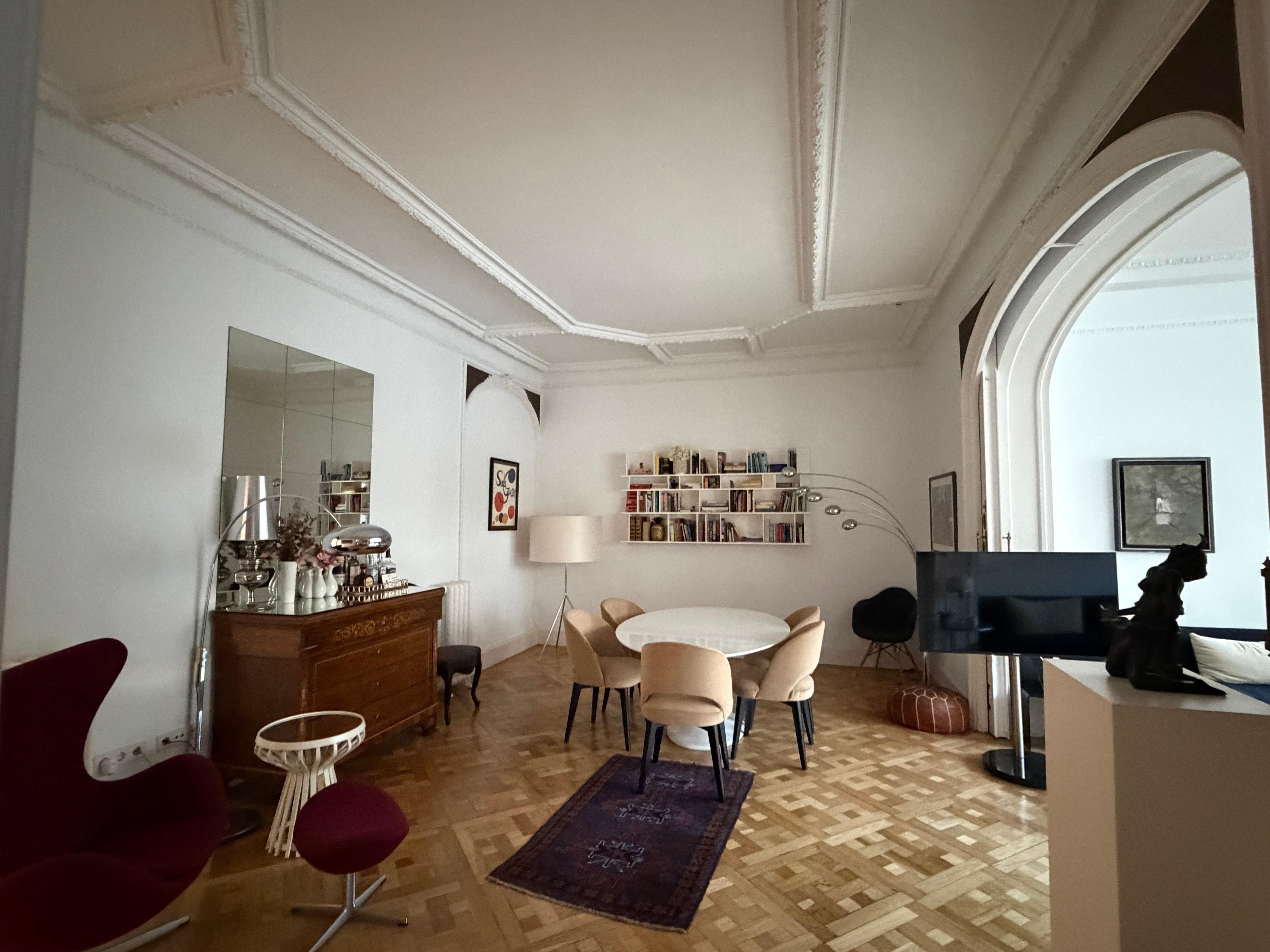 Dining room leading to sitting area and patio to the right