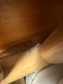 Thick layer of dust on the bed.