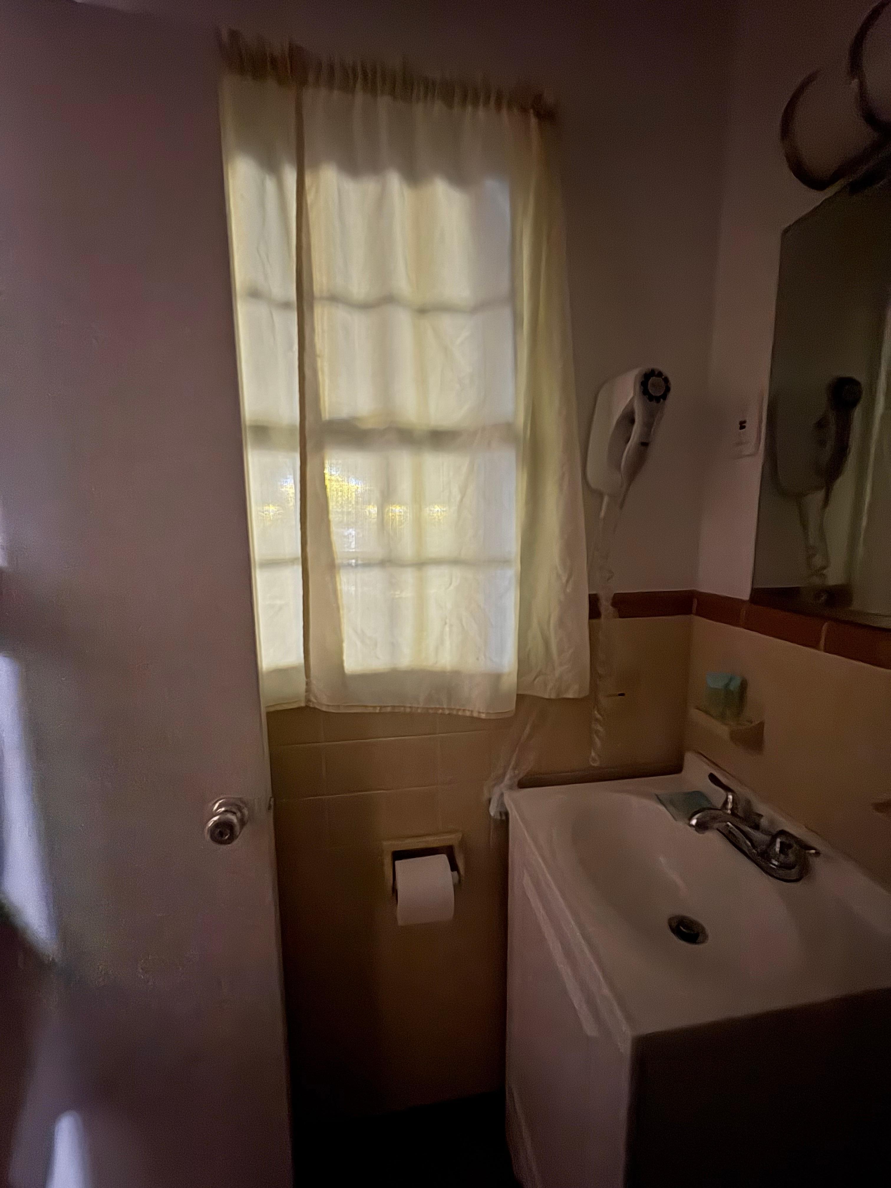 Sheer curtain in BATHROOM on ground floor