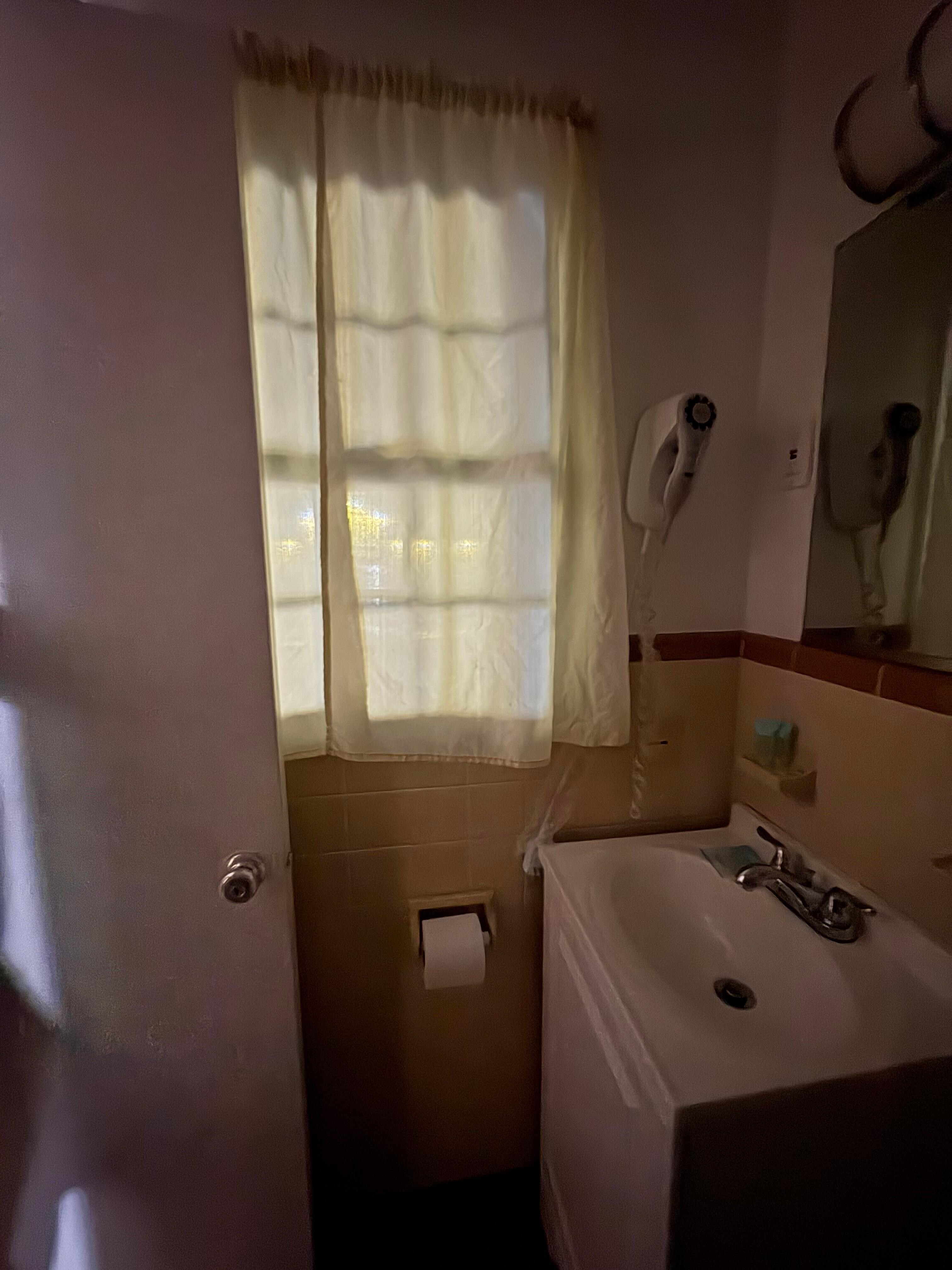 Sheer curtain in BATHROOM on ground floor