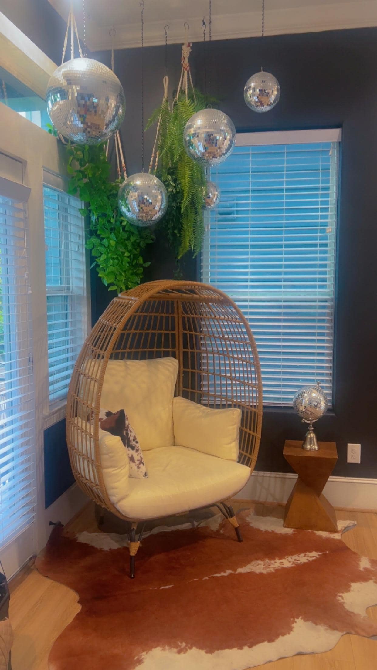 Sitting area when you arrive up the stairs on the second floor with a view of the kitchen and living room. 