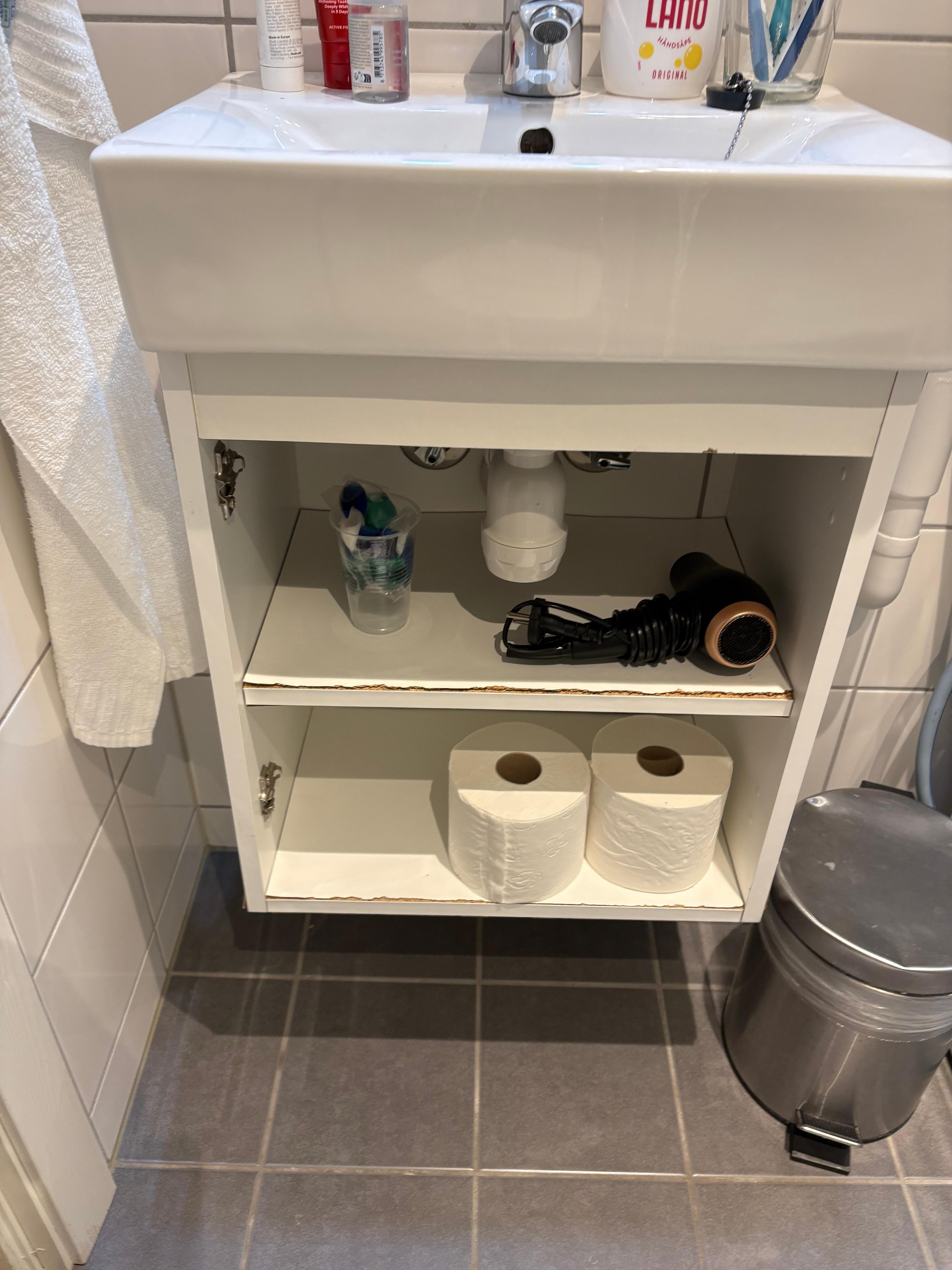missing door of bathroom cabinet