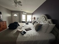 From the doorway, across the king sized bed to the balcony and view windows.