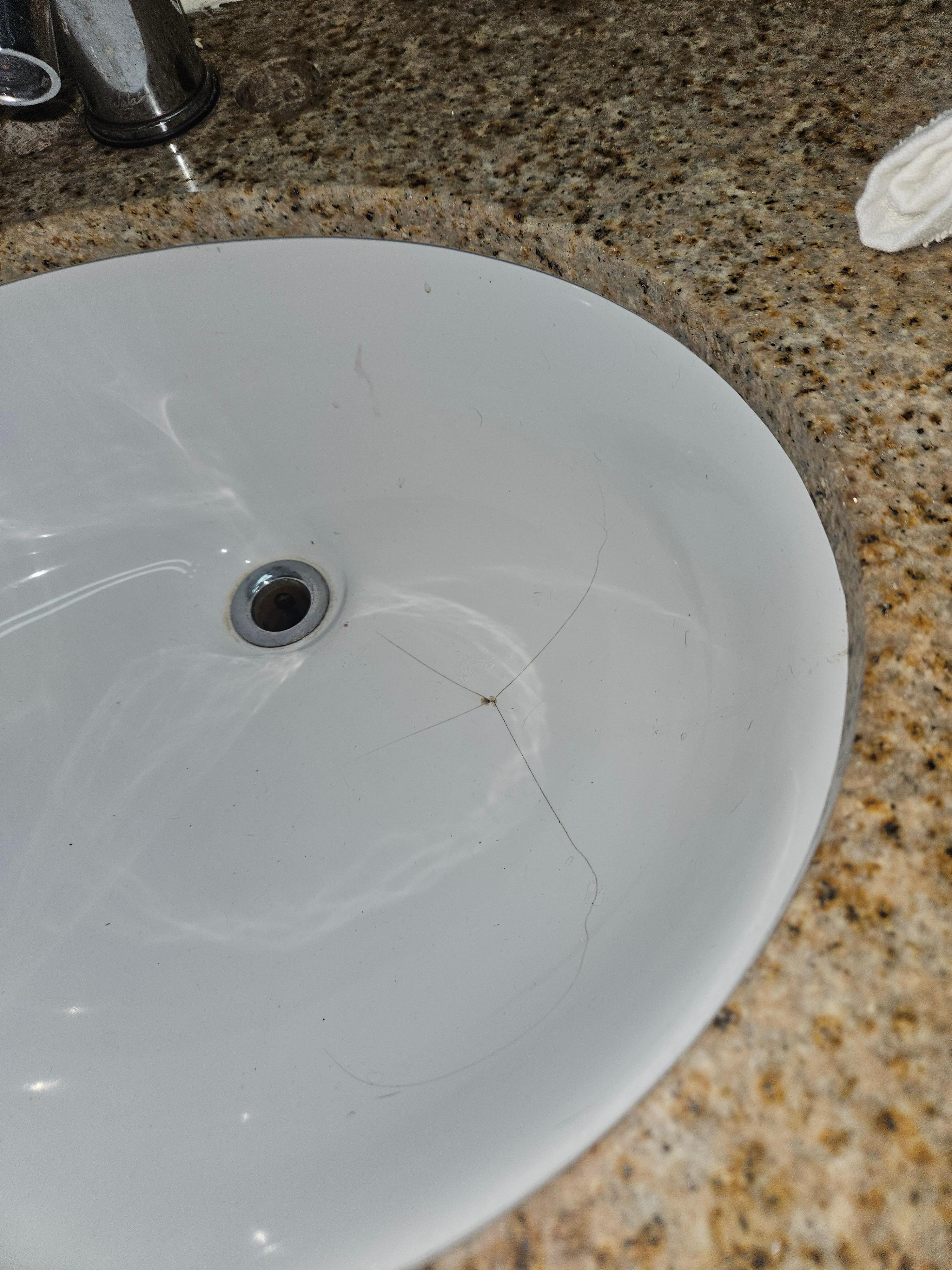 broken sink, leaking