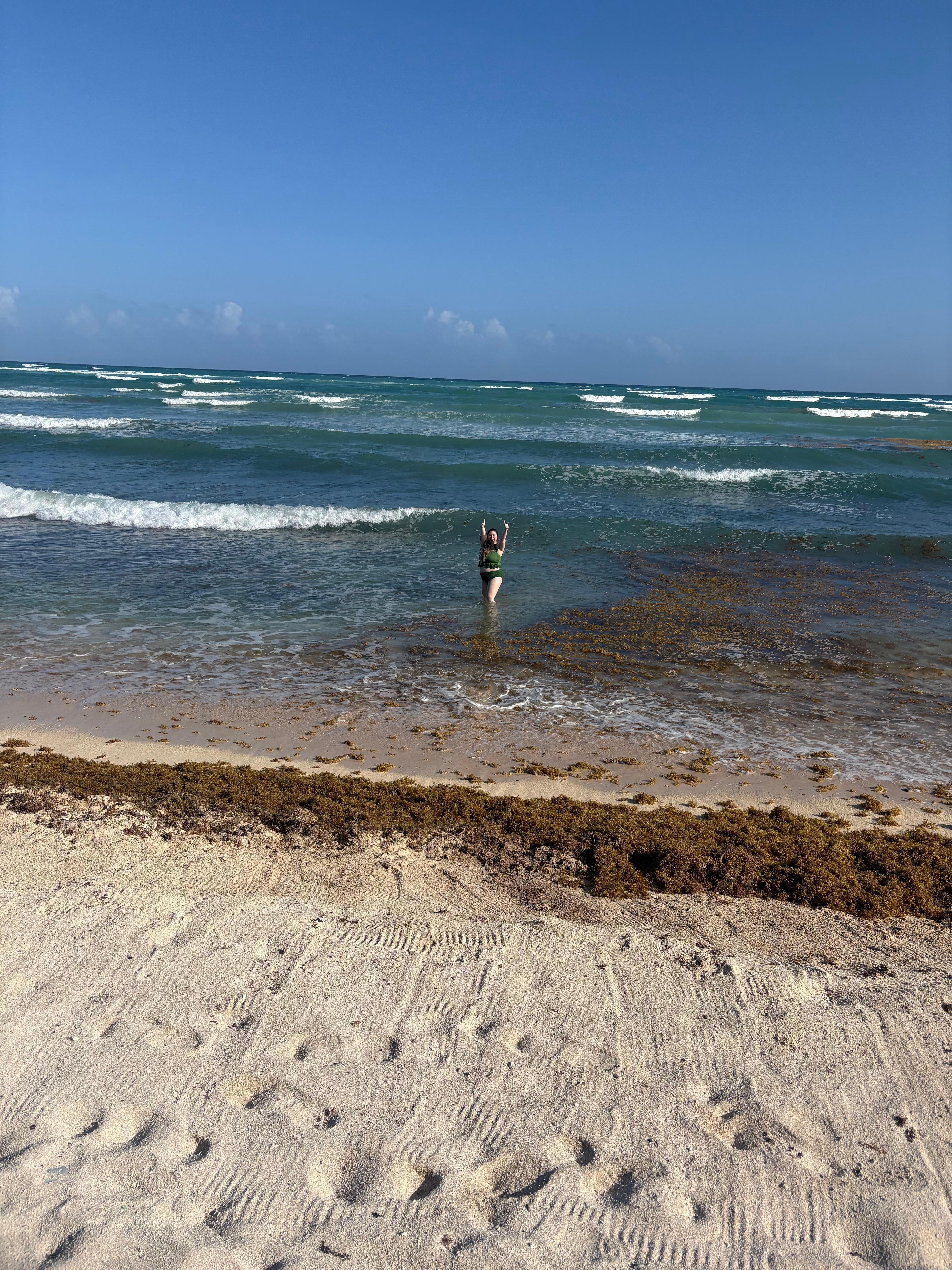 The beach has lots of coral/rocks, if you want to go in, bring water shoes