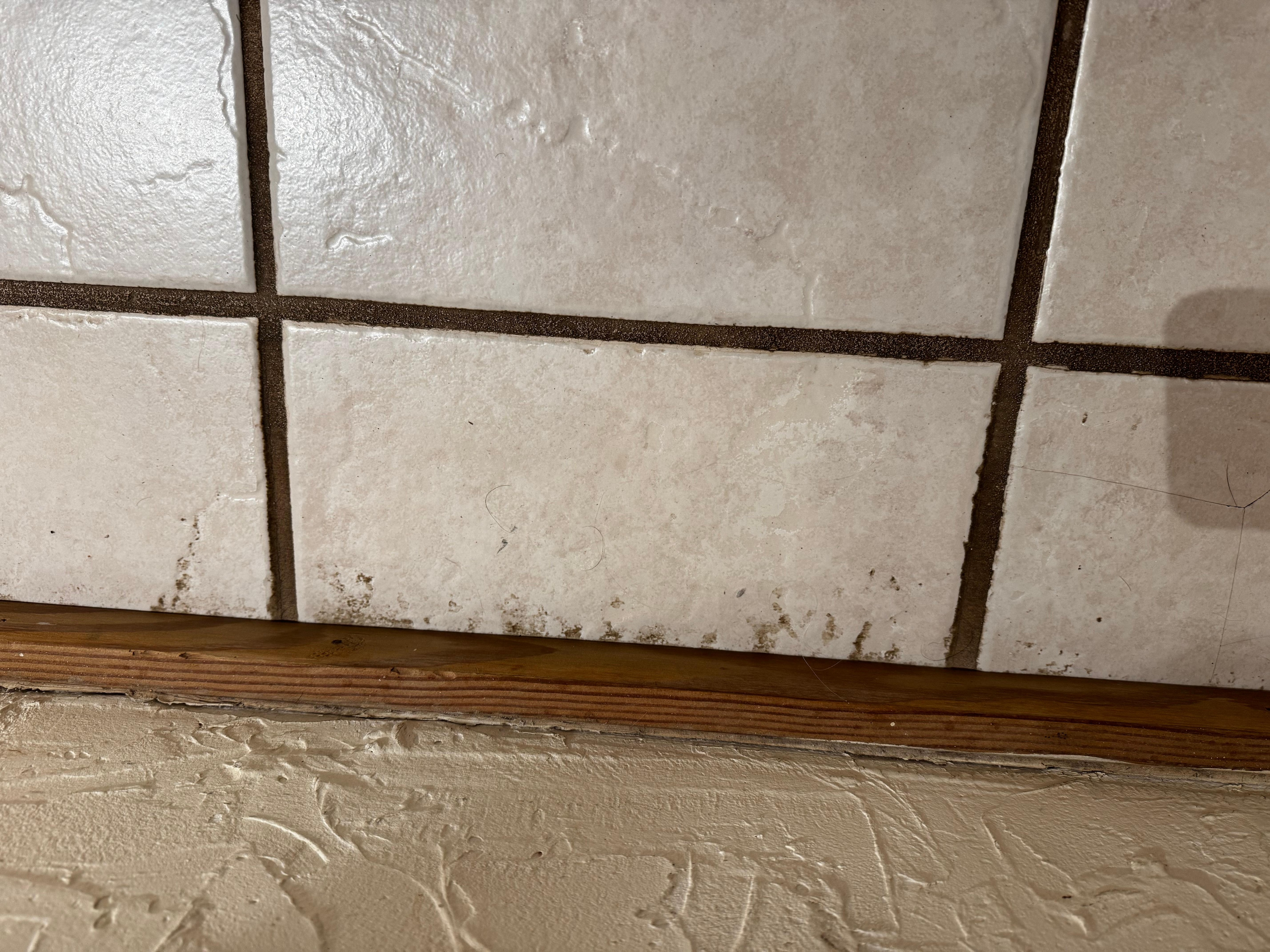 More dirty tile floors in one of the bathrooms.