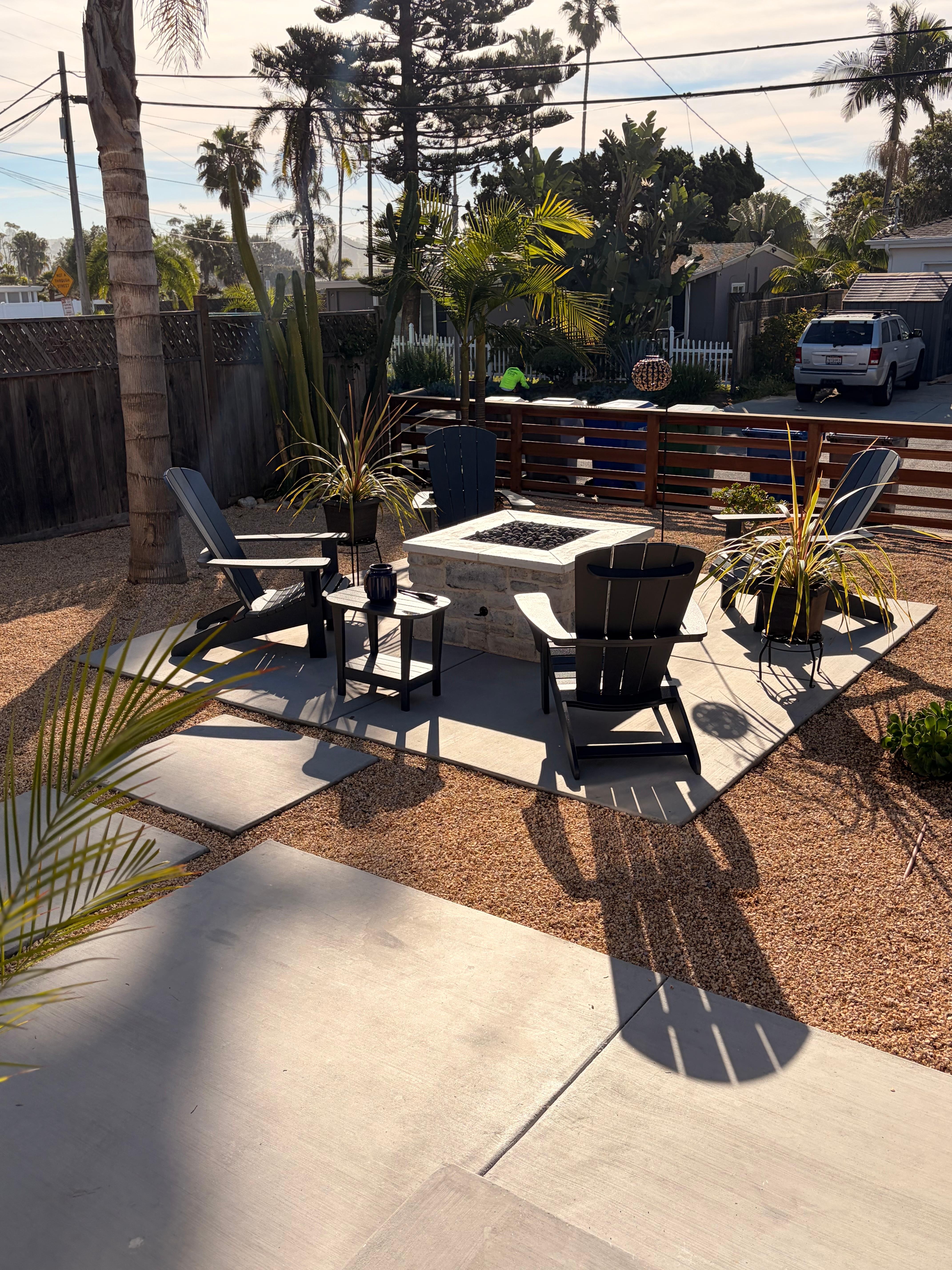 Cozy outdoor seating area and fire pit! 