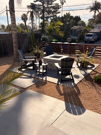Cozy outdoor seating area and fire pit!
